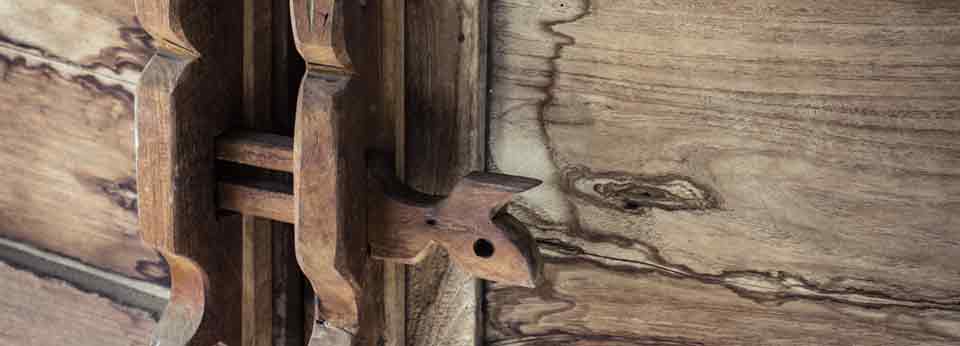 old wooden bolt header